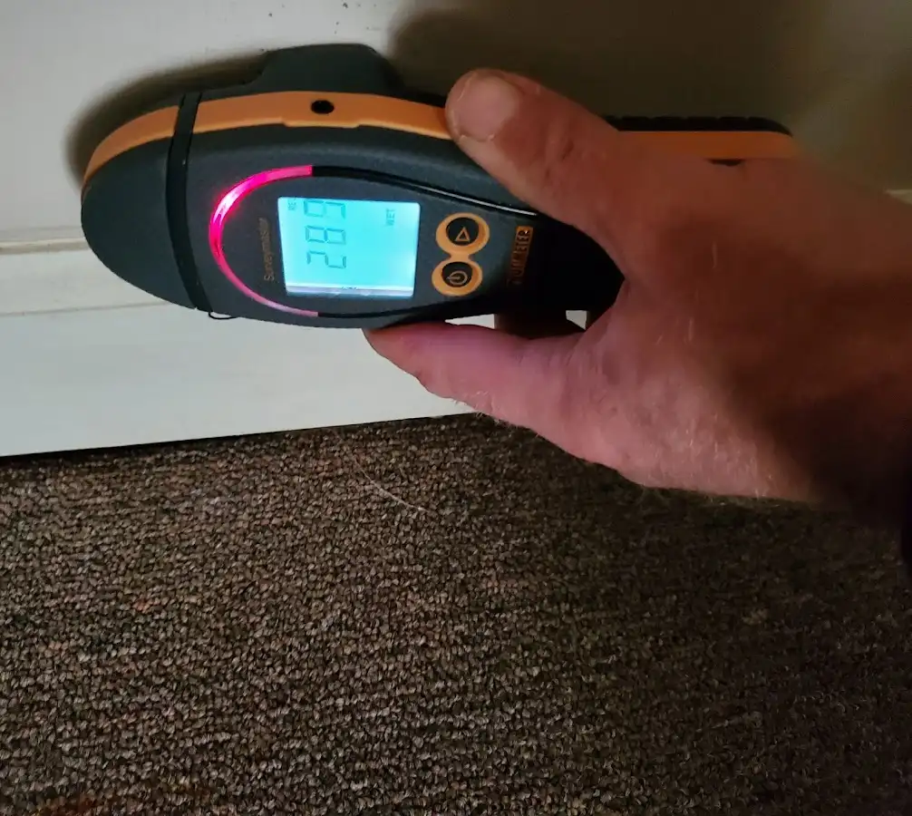Moisture detection at baseboard during Sewage Cleanup & Sanitation in Tiverton